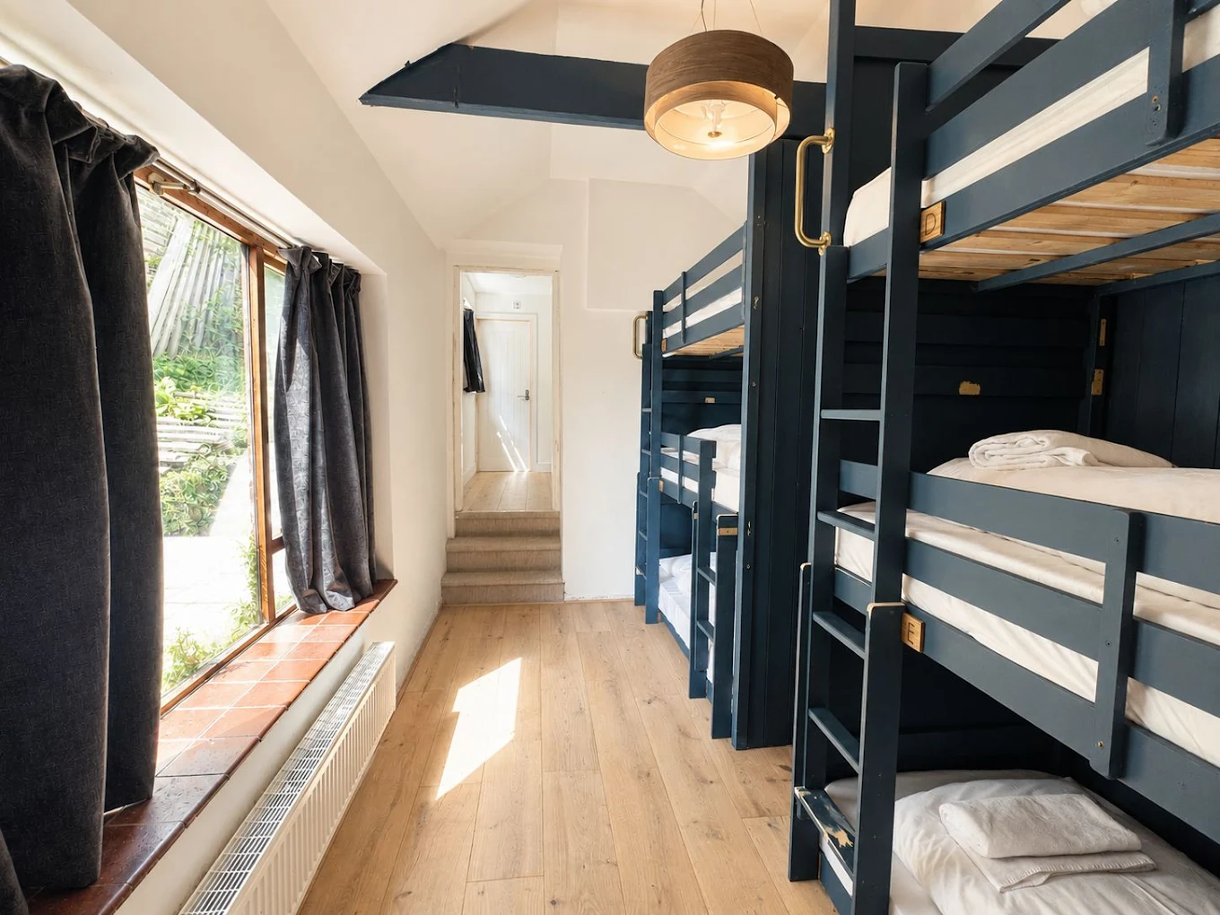 Bunks made up and ready in a Base Camp Hathersage dorm