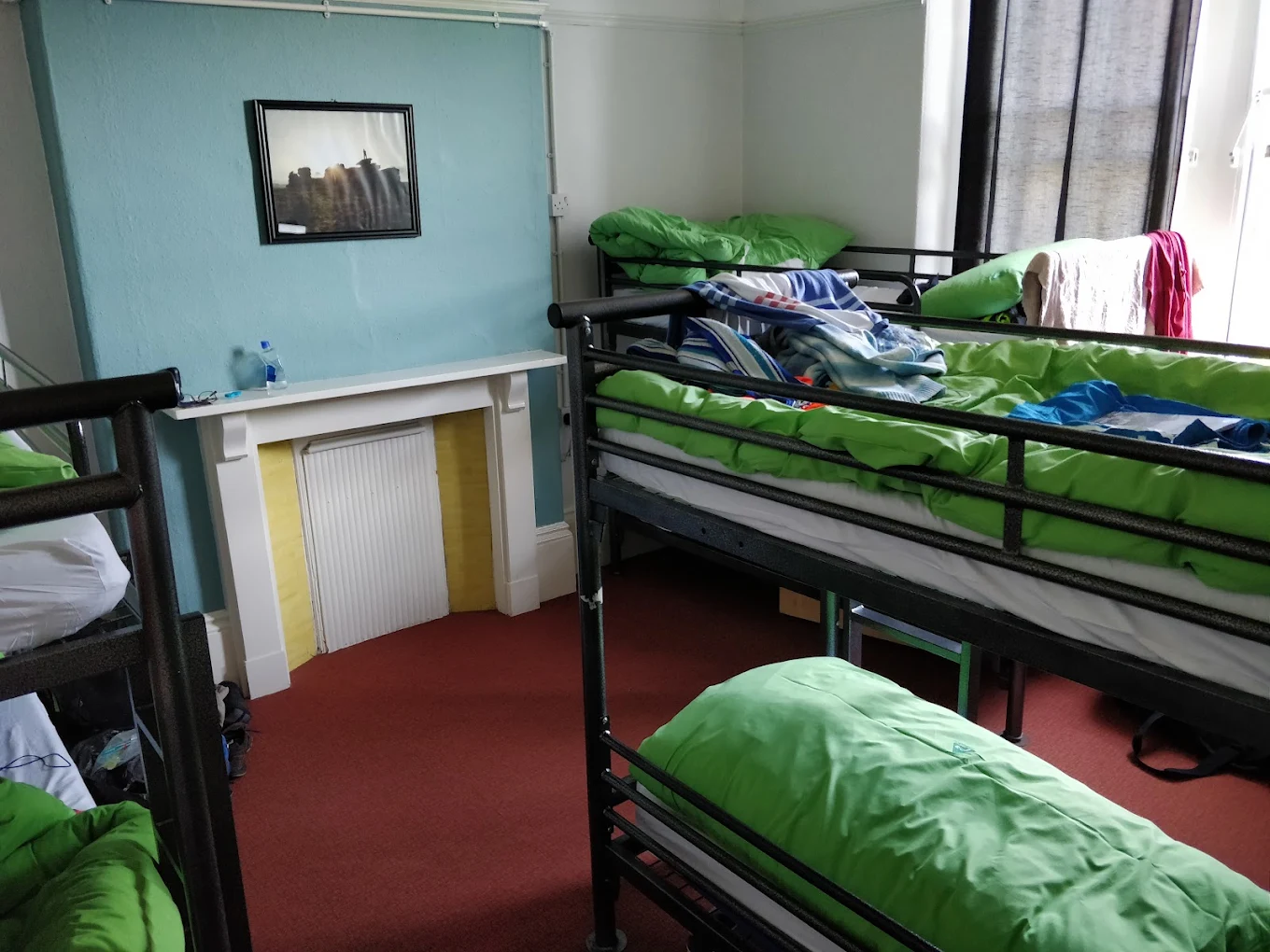 A dated dorm at the old YHA Hathersage with metal bunk beds